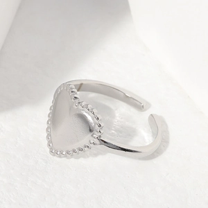 Minimalist stainless steel heart open ring in silver with beaded edge detail and adjustable band