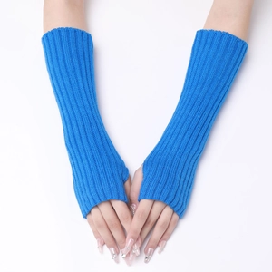 Close-up of electric blue ribbed knit long fingerless gloves showing texture