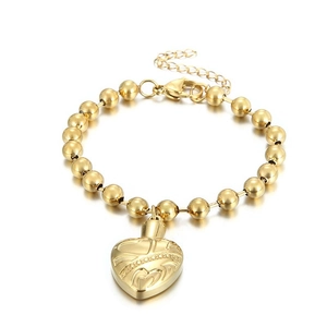 Gold beaded chain bracelet with a heart-shaped cremation pendant on a white background