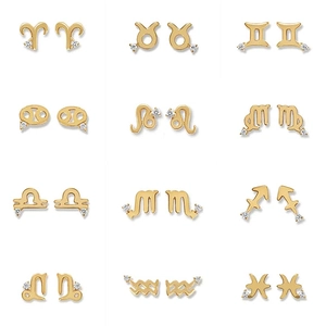 Detailed grid of twelve golden zodiac stud earrings featuring sparkling clear crystal accents