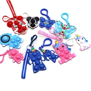 Macro shot of colorful silicone fidget keychain set with Mickey mouse and animal designs