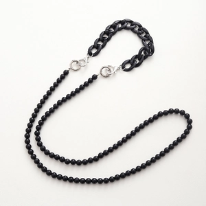 Crossbody black acrylic cell phone chain strap with large flat links and beaded strands