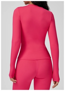 Detailed back view of pink long sleeve yoga set showing body-hugging fit and seams