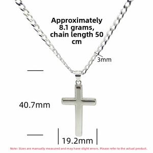 Detail view of a 925 sterling silver cross pendant measuring 40.7mm with 50cm chain