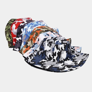 Close-up of stacked camouflage bucket hats in various patterns and colors for outdoors