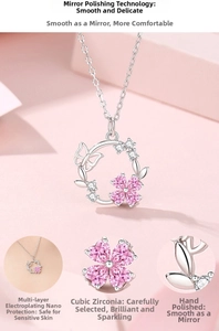 Detail view of S925 silver butterfly necklace with pink heart-shaped zirconia stones