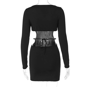 Detail view of the back cutout and tie-up design of this black slim-fit mini dress