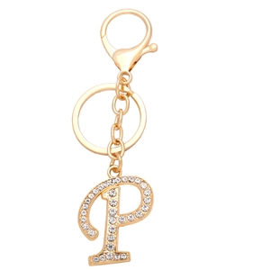Macro shot of gold-plated letter P keychain featuring crystal pavé rhinestones