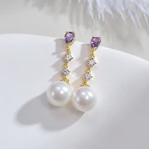 Elegant S925 silver earrings with purple teardrop crystals and lustrous white pearls