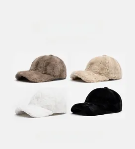 Close-up of four colors of plush faux rabbit fur baseball caps with soft top texture