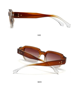 Detail view of tortoiseshell square sunglasses featuring side star rivets and gradient lenses