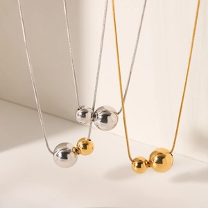 Collier chaîne serpent minimaliste avec pendentifs boules polis en or et argent pour femme