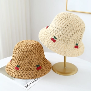 Handmade woven straw hats with red cherry embroidery and wide brim for sun protection