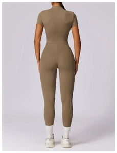Rear view detail of a khaki short-sleeve yoga bodysuit showing high-waist slimming fit