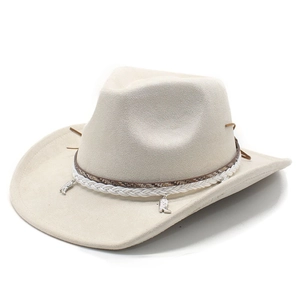 Detail of cream suede cowboy hat featuring braided bands and silver boot pendants