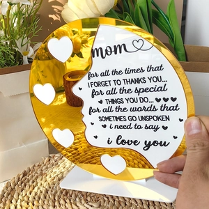 Close-up of golden acrylic Mother's Day plaque with heart cutout and loving poem
