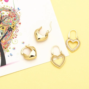 Vintage 18K gold heart earrings set featuring polished finish and sparkling zircon stones