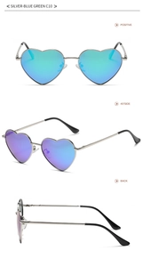 Detail view of heart-shaped sunglasses in silver with blue-green gradient lenses