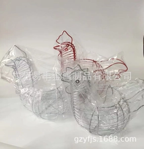 Top view of woven wire metal baskets in hen shape with silver and red finishes