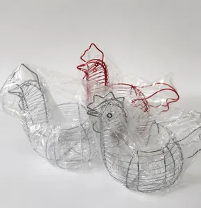 Top view of woven wire metal baskets in hen shape with silver and red finishes