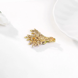Detailed back view of a lavender brooch with a golden alloy base and secure pin clasp