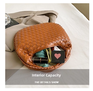 Internal capacity of brown woven PU leather handbag with daily essentials inside