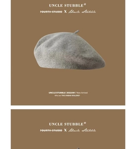 Detail view of the gray Australian wool beret fabric texture and high-quality minimalist design