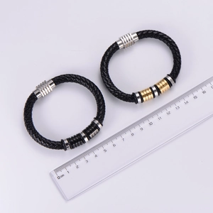 Detailed view of woven leather bracelets with magnetic clasps and size ruler reference