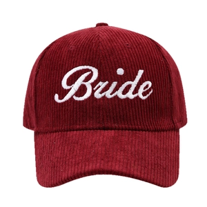 Burgundy corduroy baseball cap featuring white Bride embroidery for bridal parties