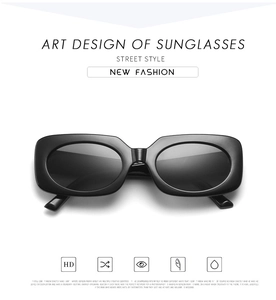 Front view of retro black rectangular sunglasses with HD dark lenses and thick frame