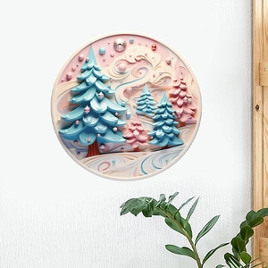 Close-up of a 3D paper cut wall sticker featuring snowy pines and pastel forest motifs