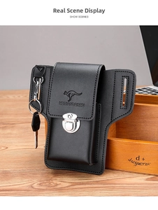 Detail of black leather phone holster with belt loops, metal clasp, and key hook hanger