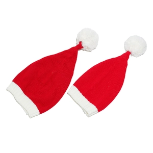 Knitted Christmas hat set for parents and children featuring classic red and white yarn