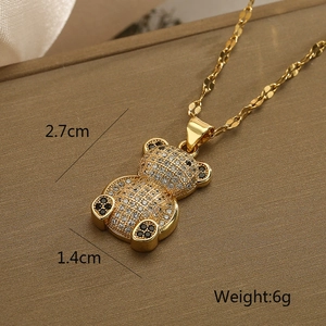 Detail view of 2.7cm gold bear pendant necklace showing exact size and 6g weight specs