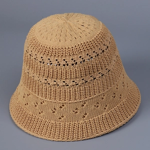 Detail showing the khaki breathable hollow-out knitted pattern of the summer bucket hat
