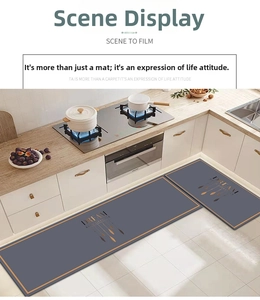 Close-up of minimalist grey non-slip kitchen mat set with elegant gold borders