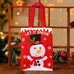 Red Christmas felt gift bag with snowman applique and Let It Snow text for holiday treats