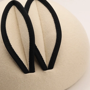 Beige wool beret featuring 3D ear decorations with black ribbed trim for a cute style
