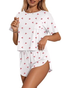 Detail of white two-piece loungewear set with red cherry print and drawstring waist