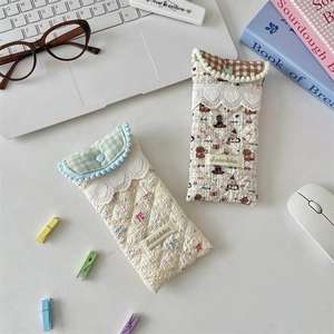 Quilted cotton eyeglass pouches featuring heart lace details and check patterns