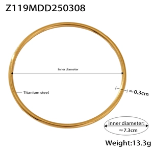 Detail view of 18K gold plated stainless steel bangle showing 7.3cm diameter measurement