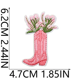 Detailed view of pink cowboy boot embroidery patch with flowers and size measurements