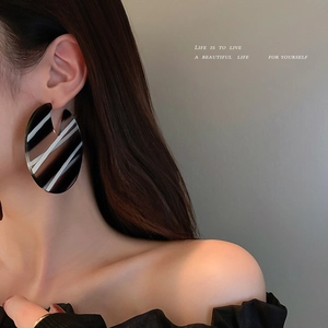 Fashionable oversized acrylic hoop earrings with black and white stripes for women