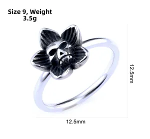 Close-up of gothic skull ring with floral petals in antique silver finish, 12.5mm size