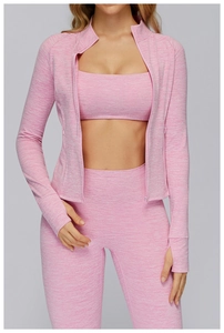 Pink marled yoga set detail showing high-waist leggings and thumbhole cuffs on sleeves