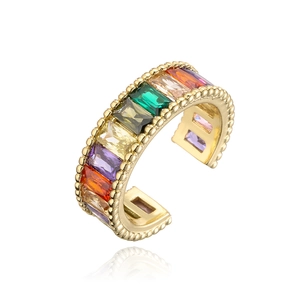 Macro shot of colorful baguette-cut zircon stones on a gold-plated beaded open ring band