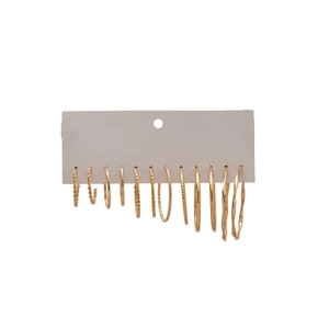 6-pair set of gold twisted hoop earrings with minimalist texture on display card