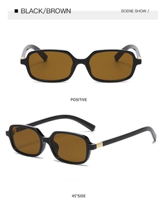 Schwarze quadratische Sonnenbrille mit braunen Gläsern und schicken Metalldetails, Detailansicht.