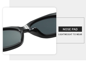 Gros plan sur les plaquettes de nez intégrées légères sur lunettes œil de chat noires