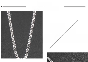 Detailed macro view of 316L stainless steel silver chain link with fine polished texture